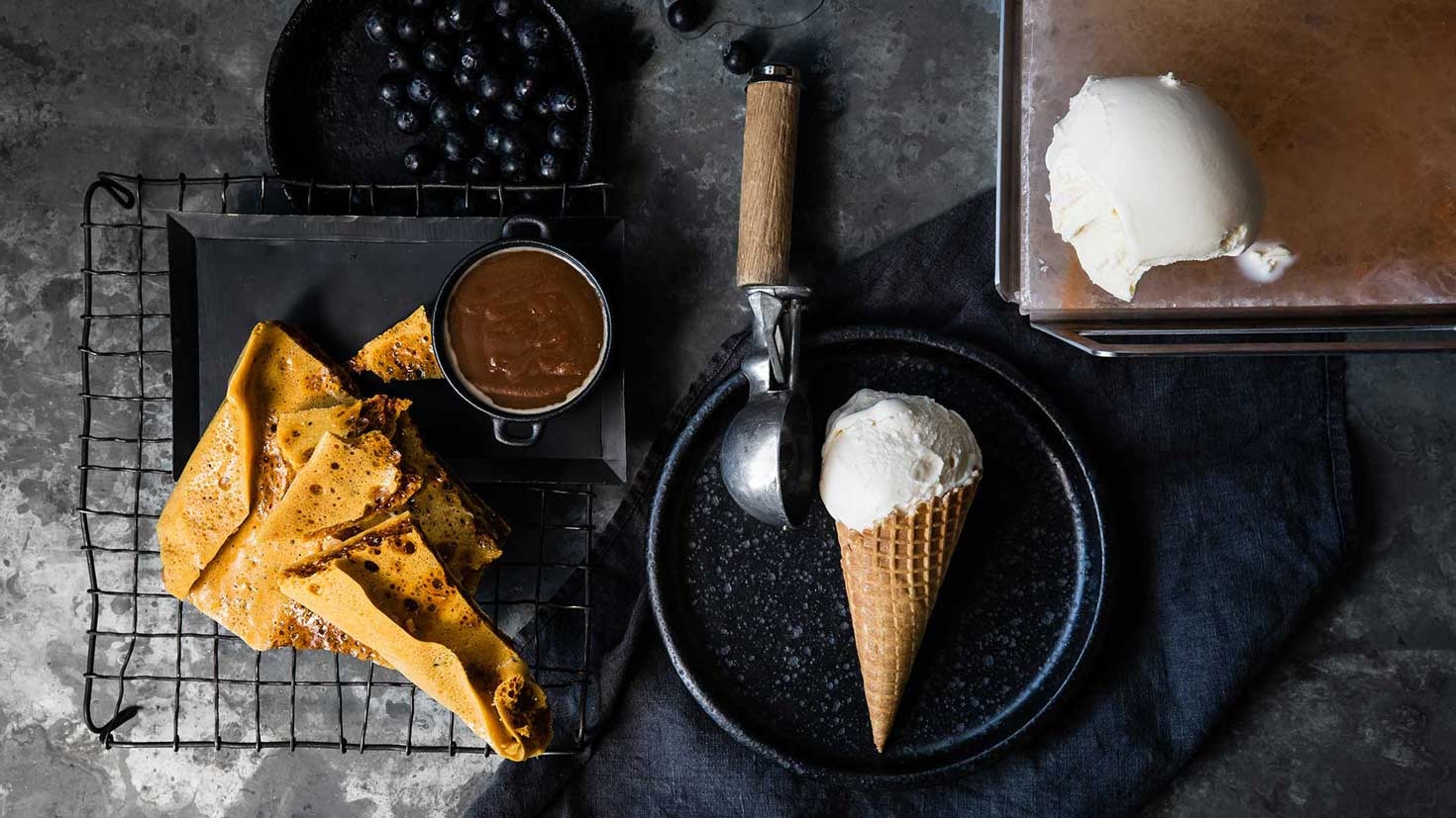 HASSELBACK POTATOESICE-CREAM WITH HONEYCOMB, BLUEBERRIES AND SALTED BUTTER CARAMEL
