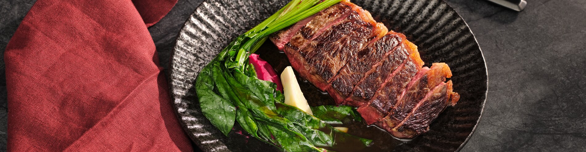 Beautiful red meat cooked to perfection with vegetables as a side dish