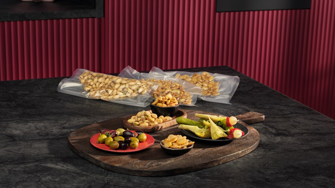 Mixed nuts and fruits on share platter